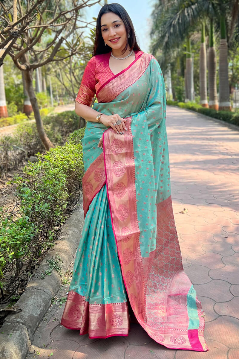 Resonant Firozi Soft Banarasi Tissue Silk Saree With Majesty Blouse Piece