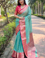 Resonant Firozi Soft Banarasi Tissue Silk Saree With Majesty Blouse Piece