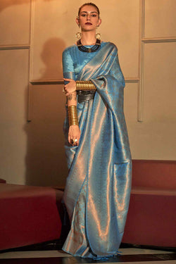 Enticing Firozi Kanjivaram Silk Saree With Assemblage Blouse Piece