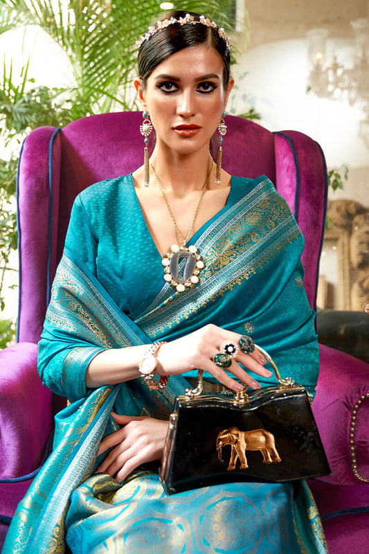 Luxuriant Firozi Kanjivaram Silk Saree With Enchanting Blouse Piece