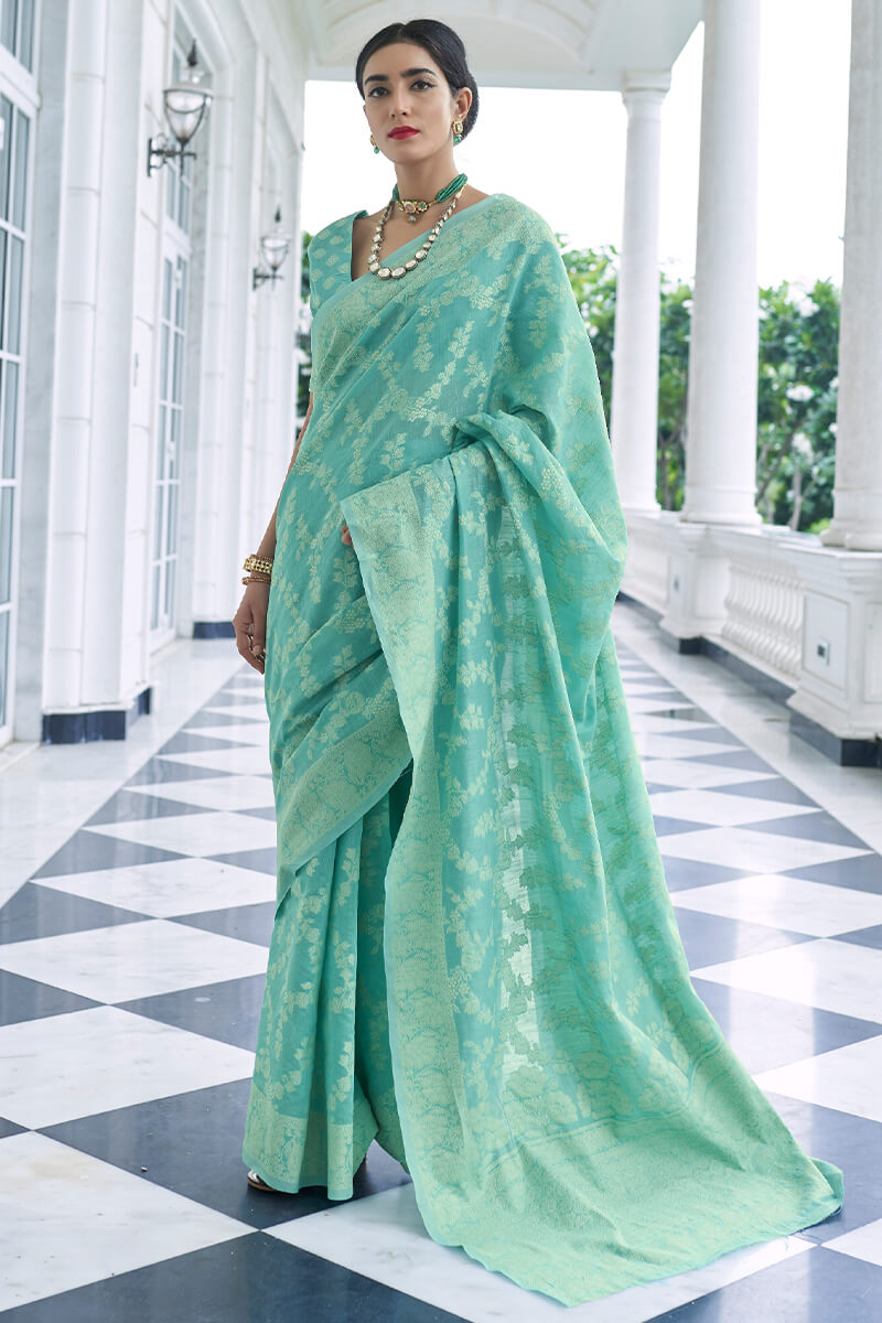 Nemesi Turquoise Lucknowi Silk Saree and Inspiring Blouse Piece