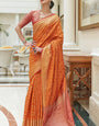 Eclat Orange Soft Patola Silk Saree with Nebula Blouse Piece