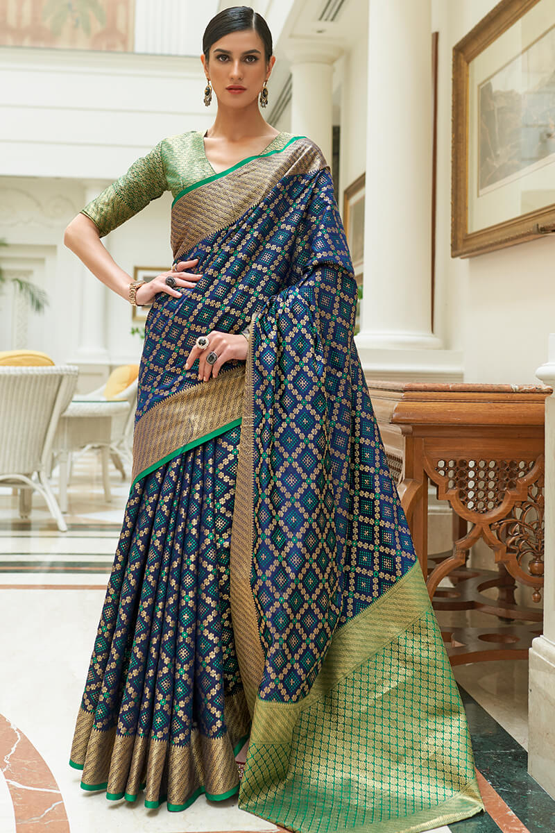 Verdant Navy Blue Soft Patola Silk Saree with Scrupulous Blouse Piece