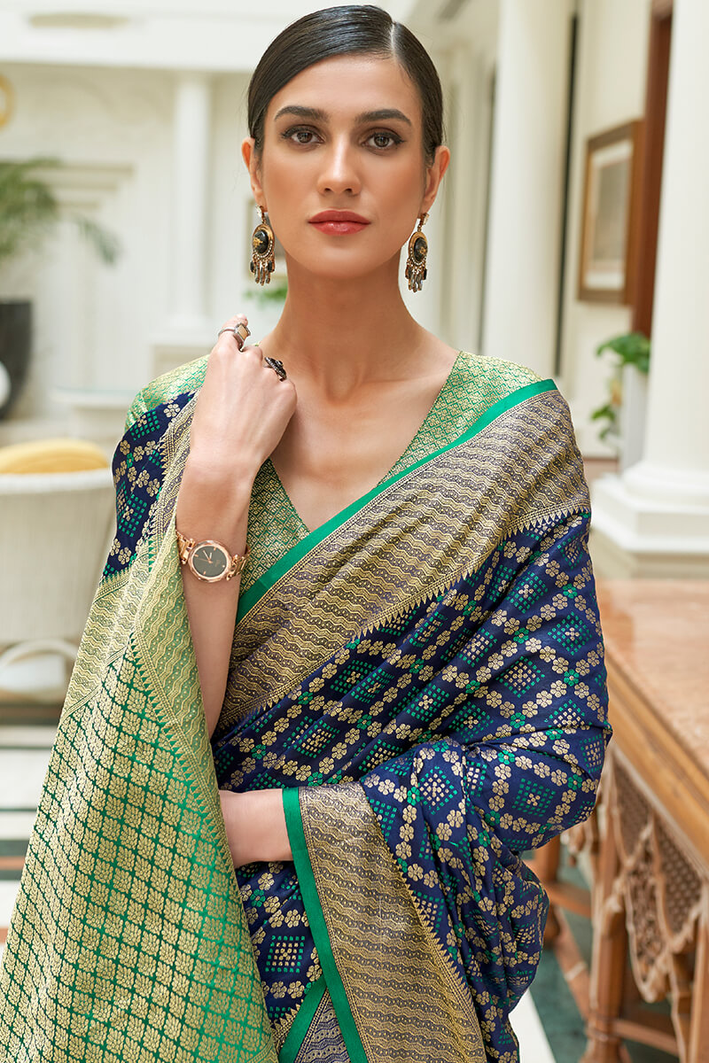 Verdant Navy Blue Soft Patola Silk Saree with Scrupulous Blouse Piece