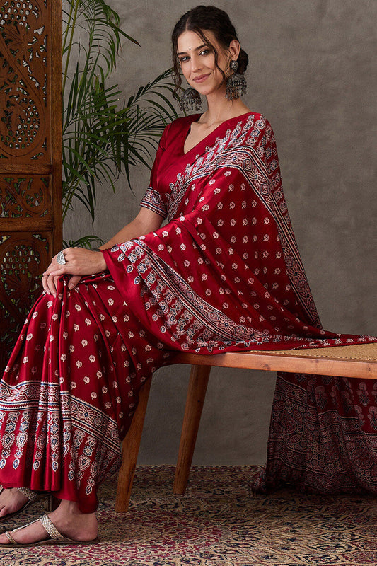 Fugacious Red Ajrakh Printed Semi Modal Silk Saree With Murmurous Blouse Piece