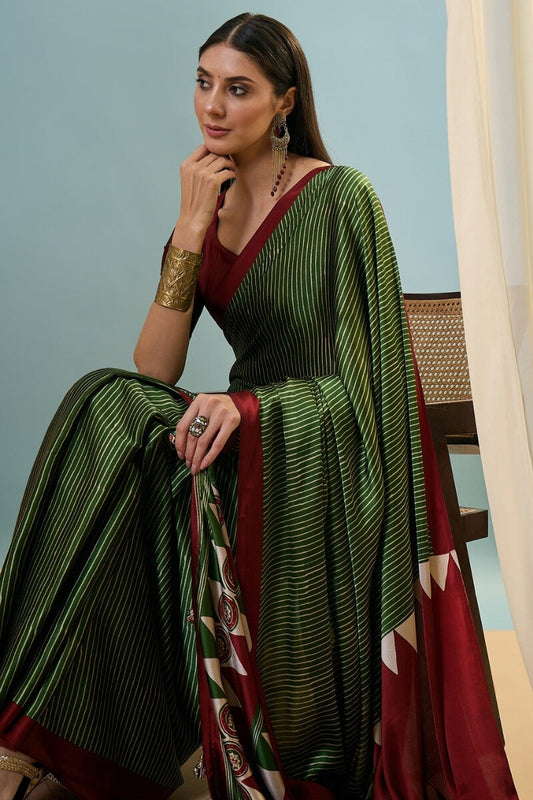 Designer Dark Green Ajrakh Printed Semi Modal Silk Saree With Scintillating Blouse Piece