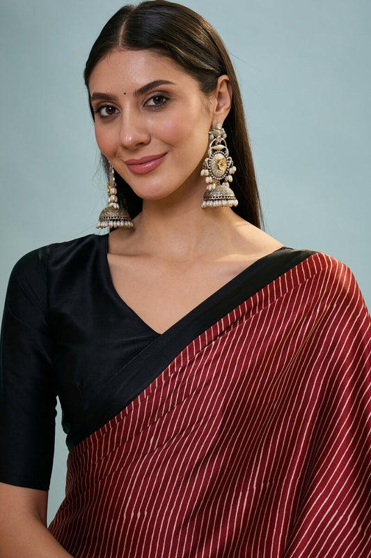 Fragrant Maroon Ajrakh Printed Semi Modal Silk Saree With Palimpsest Blouse Piece