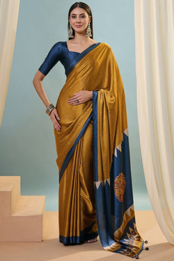 Surpassing Mustard Ajrakh Printed Semi Modal Silk Saree With Vivacious Blouse Piece