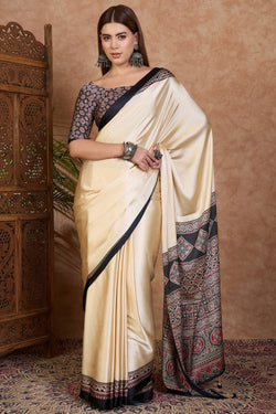 Mesmeric Off White Ajrakh Printed Semi Modal Silk Saree With Gleaming Blouse Piece