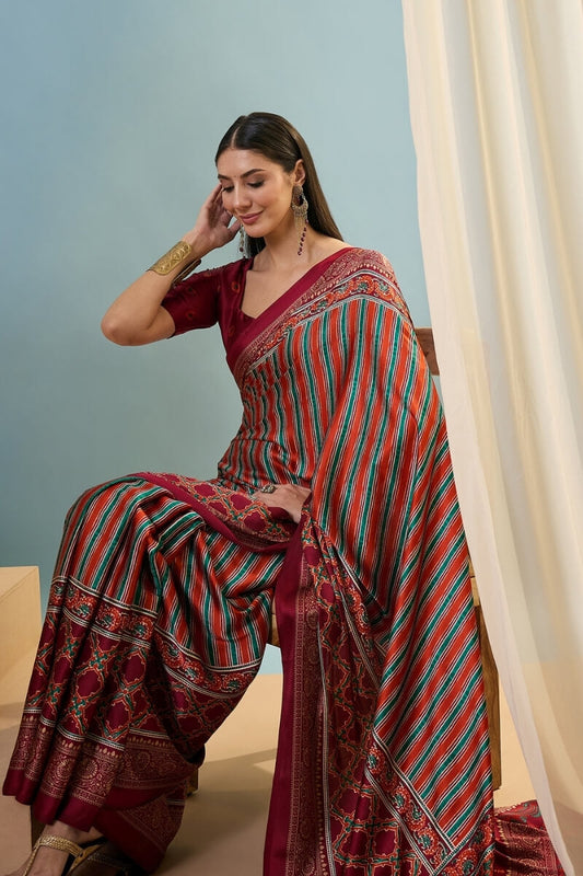 Prominent Red Ajrakh Printed Semi Modal Silk Saree With Dazzling Blouse Piece