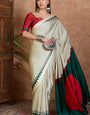 Angelic Off White Ajrakh Printed Semi Modal Silk Saree With Breathtaking Blouse Piece