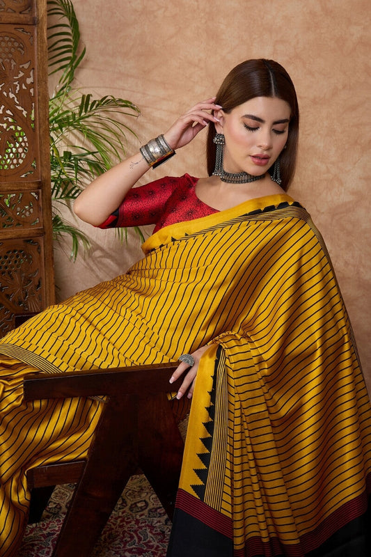 Appealing Yellow Ajrakh Printed Semi Modal Silk Saree With Dalliance Blouse Piece