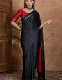 Exquisite Black Ajrakh Printed Semi Modal Silk Saree With Ineffable Blouse Piece
