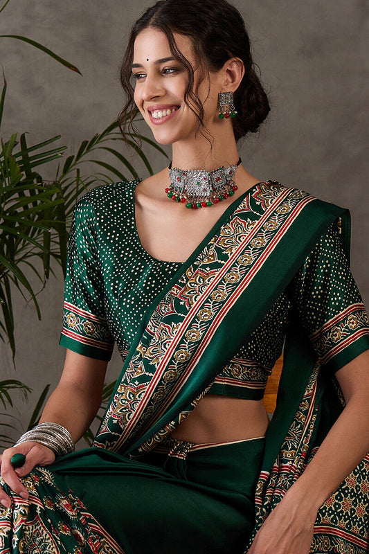Most Luminous Dark Green Ajrakh Printed Semi Modal Silk Saree With Sonorous Blouse Piece