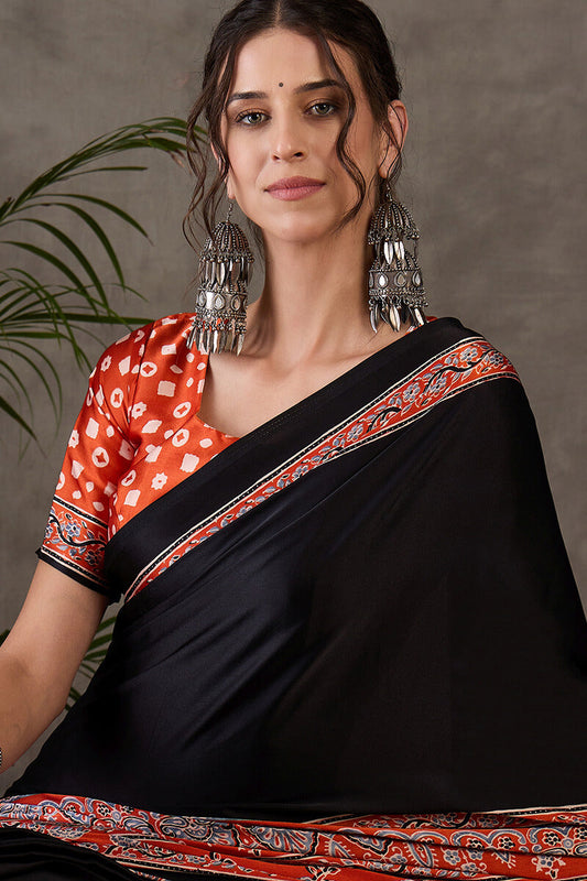 Ethnic Black Ajrakh Printed Semi Modal Silk Saree With Opulent Blouse Piece