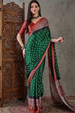Mellifluous Dark Green Ajrakh Printed Semi Modal Silk Saree With Embellished Blouse Piece