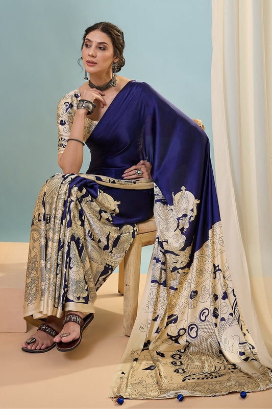 Elaborate Navy Blue Ajrakh Printed Semi Modal Silk Saree With Elision Blouse Piece