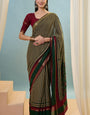 Engaging Dark Green Printed Cotton Silk Saree With Imbrication Blouse Piece