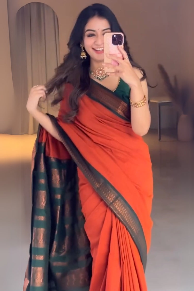 Luxuriant Orange Soft Silk Saree With Elision Blouse Piece