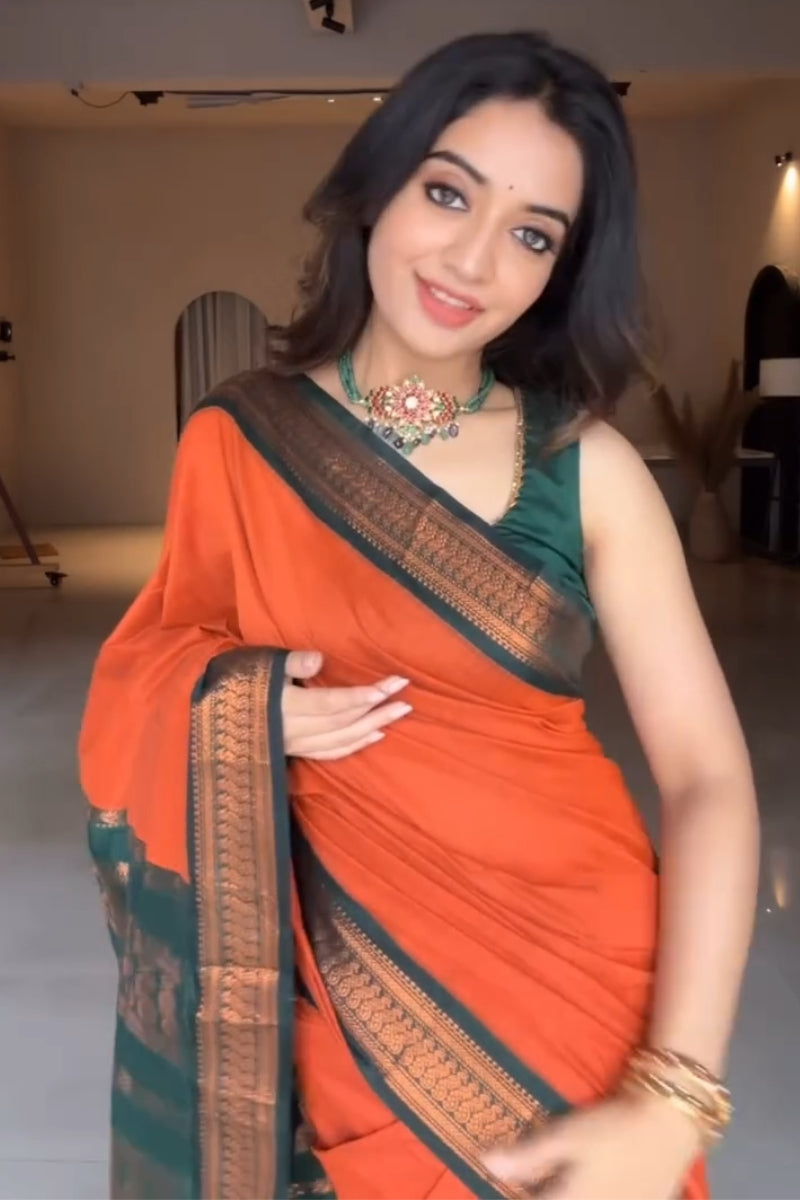 Luxuriant Orange Soft Silk Saree With Elision Blouse Piece