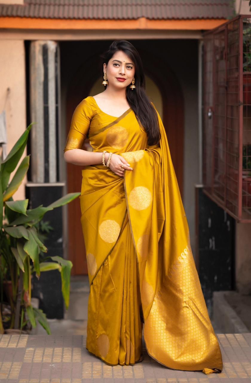 Prominent Yellow Soft Silk Saree With Ratatouille Blouse Piece