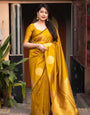 Prominent Yellow Soft Silk Saree With Ratatouille Blouse Piece