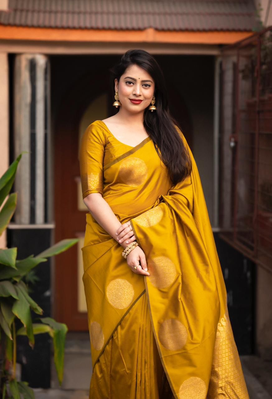 Prominent Yellow Soft Silk Saree With Ratatouille Blouse Piece