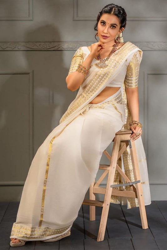 Arresting Off White Soft Silk Saree With Scrumptious Blouse Piece