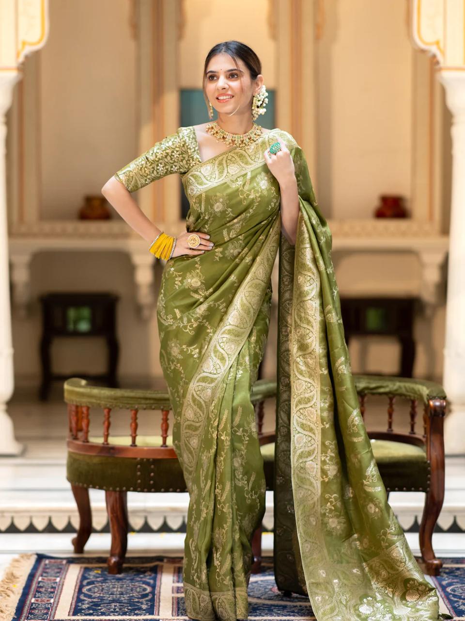 Enigmatic Mehndi Soft Silk Saree With Serendipity Blouse Piece