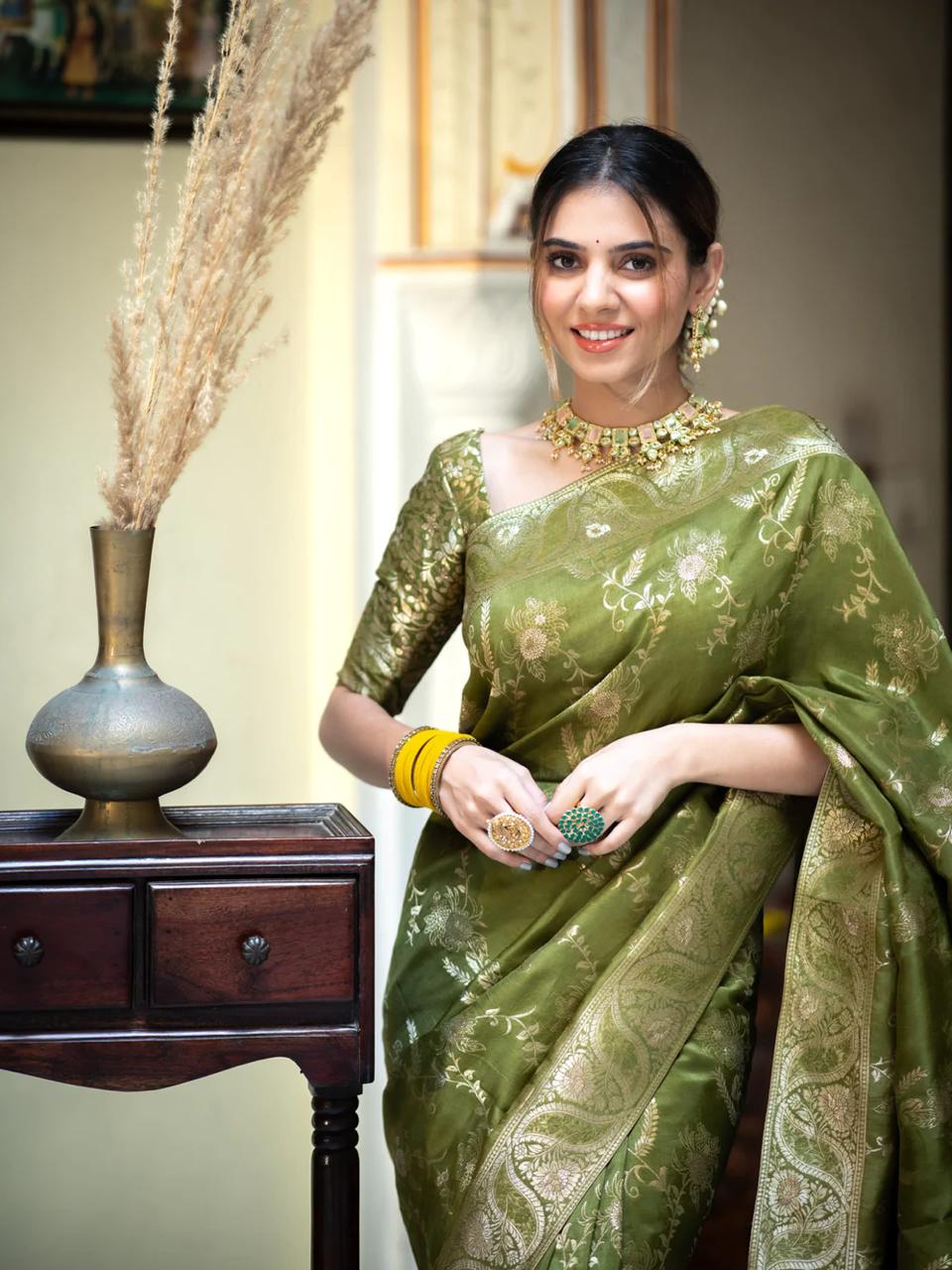 Enigmatic Mehndi Soft Silk Saree With Serendipity Blouse Piece