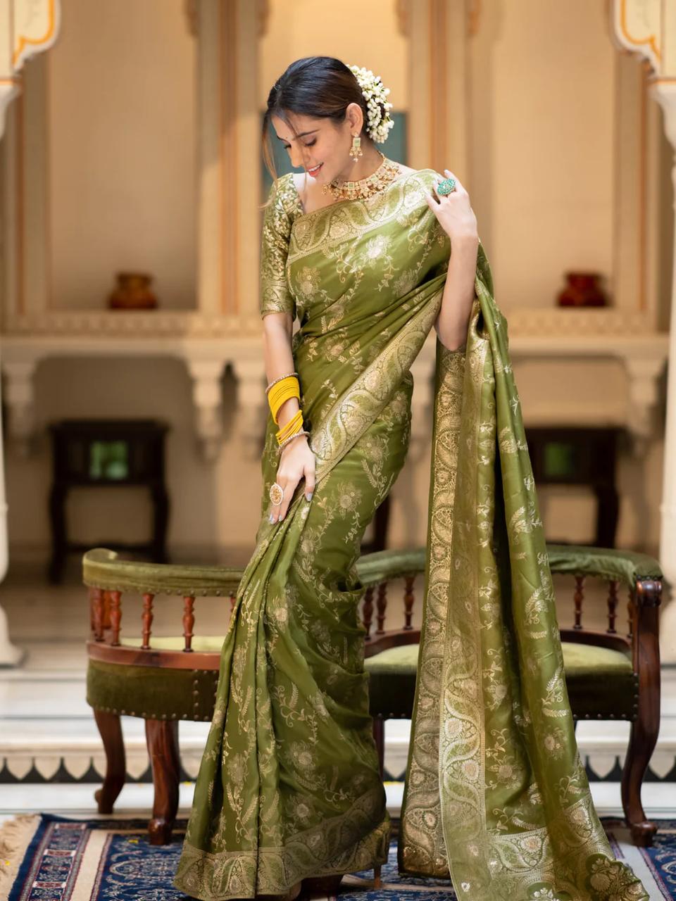 Enigmatic Mehndi Soft Silk Saree With Serendipity Blouse Piece