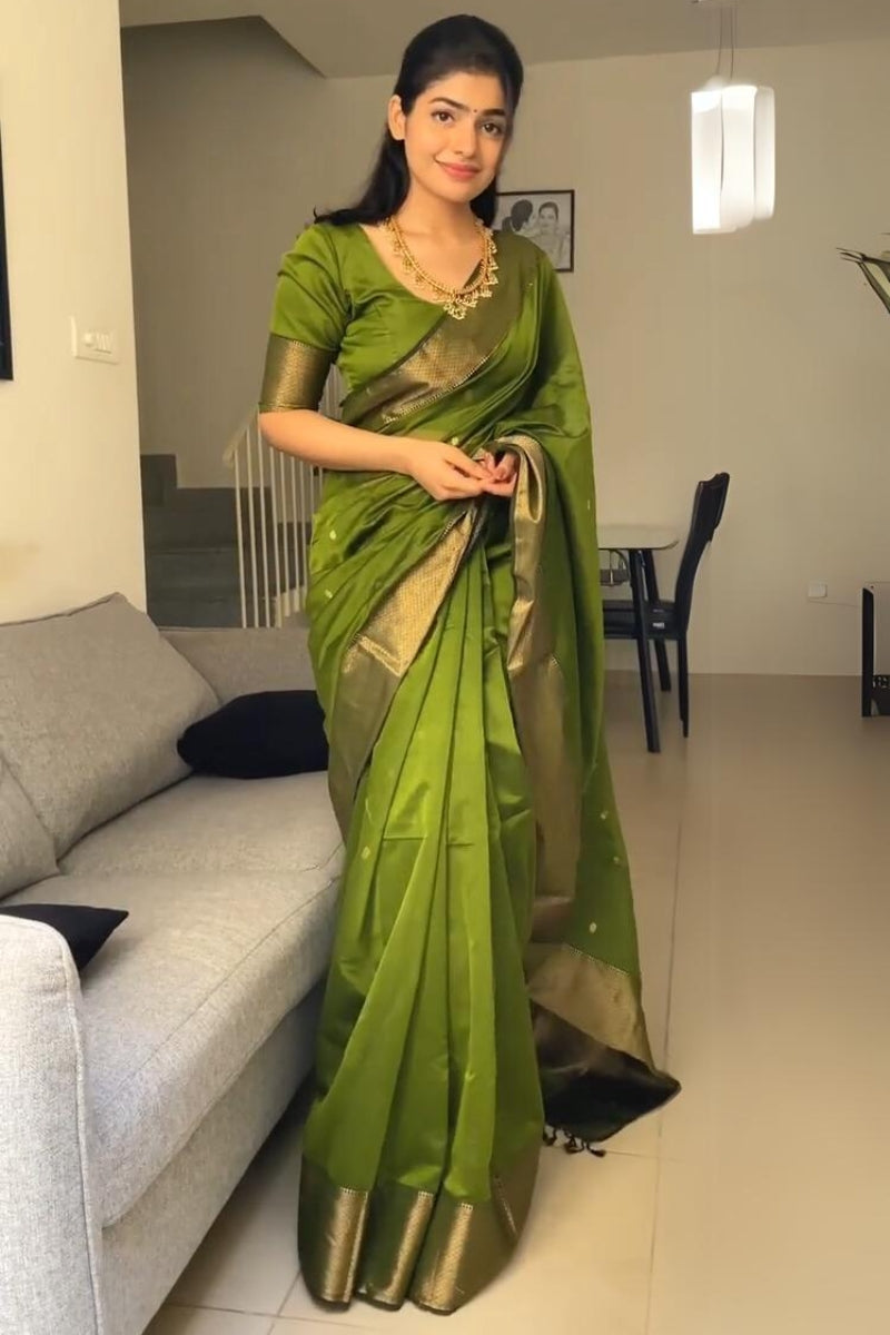 Fancifull Green Cotton Silk Saree With Hypnotic Blouse Piece