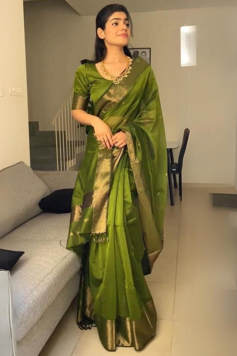 Fancifull Green Cotton Silk Saree With Hypnotic Blouse Piece