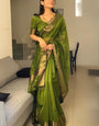 Fancifull Green Cotton Silk Saree With Hypnotic Blouse Piece