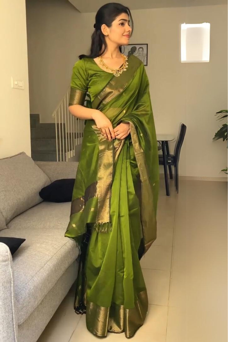 Fancifull Green Cotton Silk Saree With Hypnotic Blouse Piece