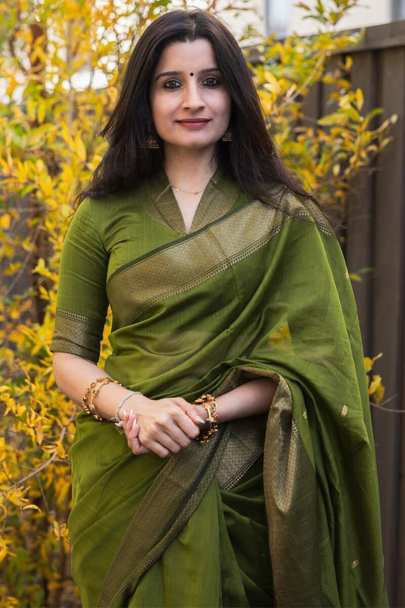 Admirable Green Cotton Silk Saree With Girlish Blouse Piece