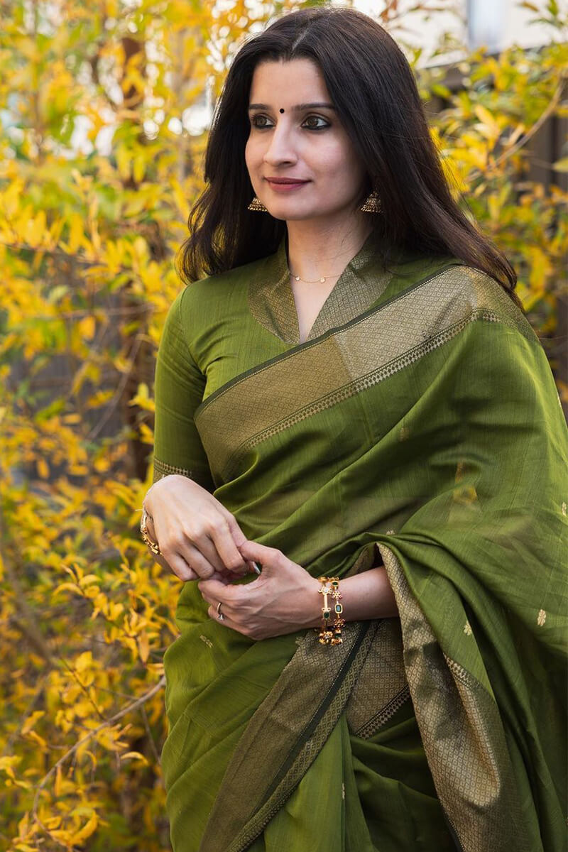 Admirable Green Cotton Silk Saree With Girlish Blouse Piece