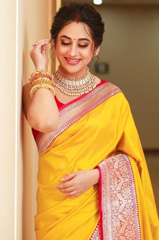 Tantalizing Yellow Soft Silk Saree With Pleasurable Blouse Piece