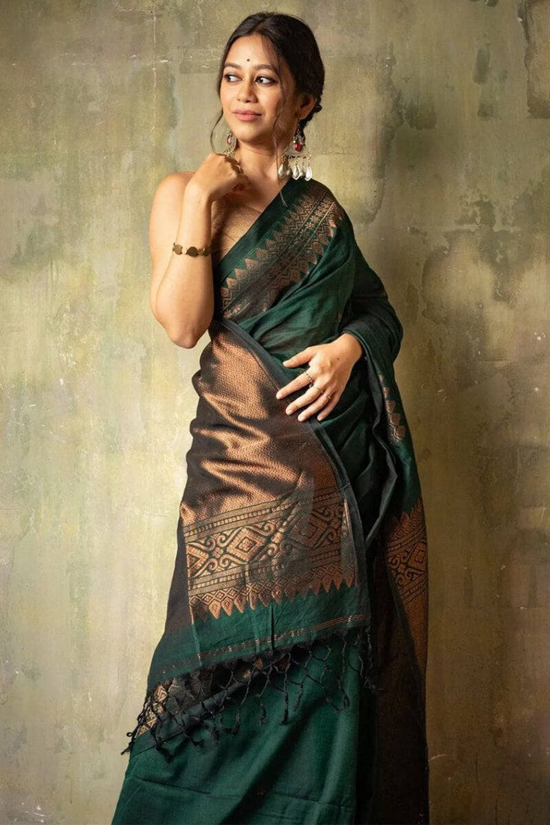Lagniappe Dark Green Soft Silk Saree With Sumptuous Blouse Piece