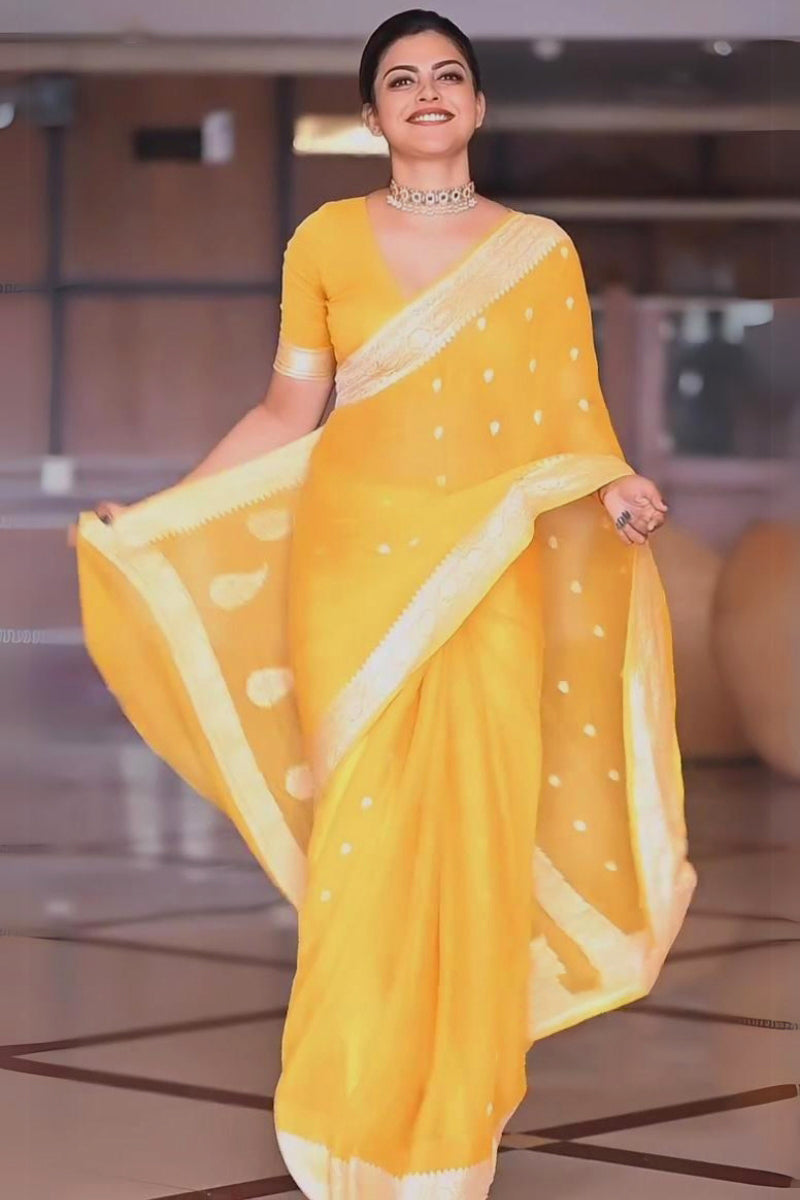 Scrumptious Yellow Soft Silk Saree With Devastating Blouse Piece