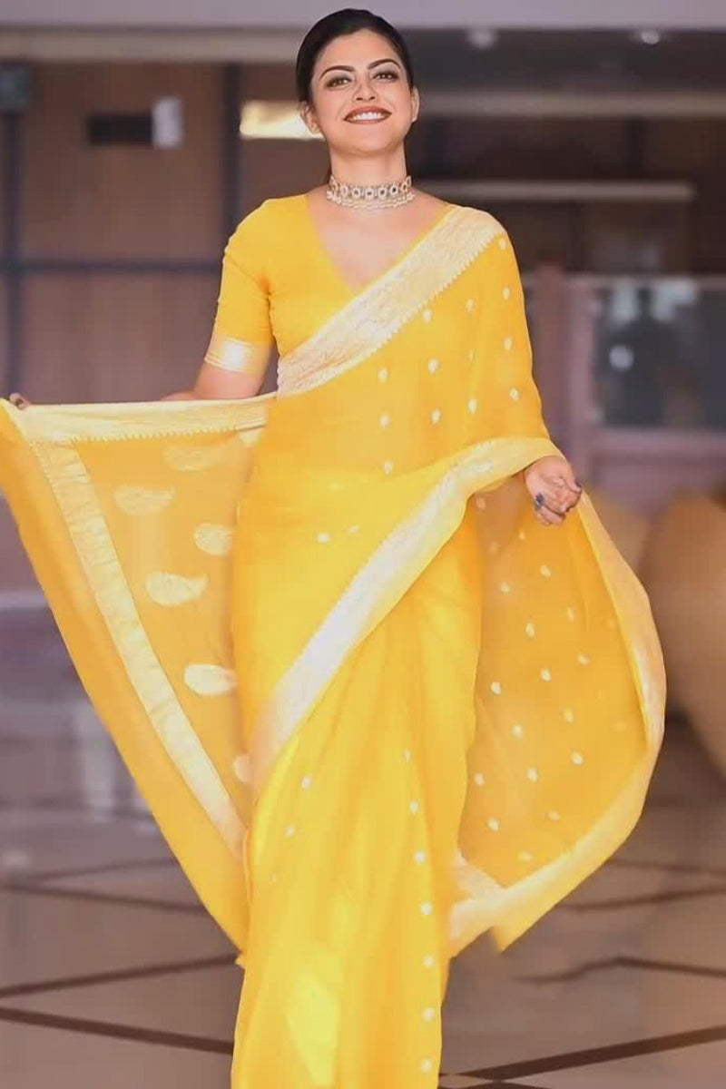 Scrumptious Yellow Soft Silk Saree With Devastating Blouse Piece