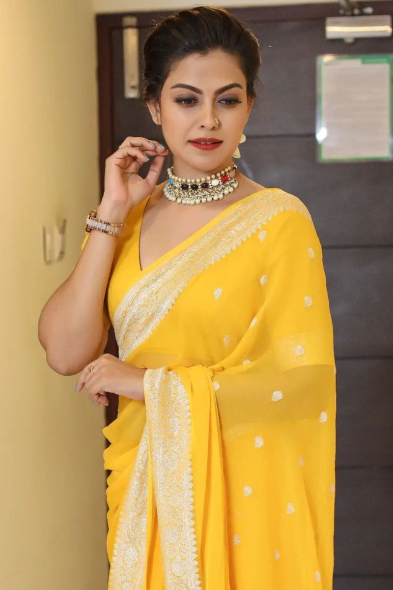 Scrumptious Yellow Soft Silk Saree With Devastating Blouse Piece