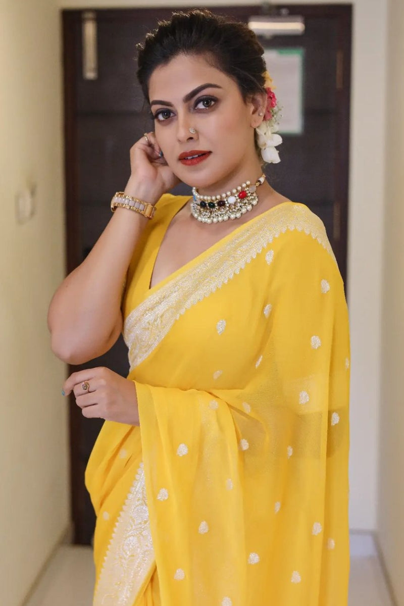 Scrumptious Yellow Soft Silk Saree With Devastating Blouse Piece