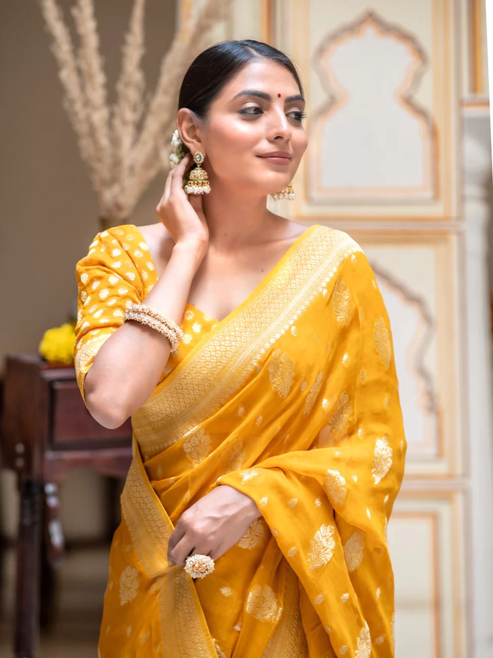 Demanding Yellow Soft Banarasi Silk Saree With Impressive Blouse Piece