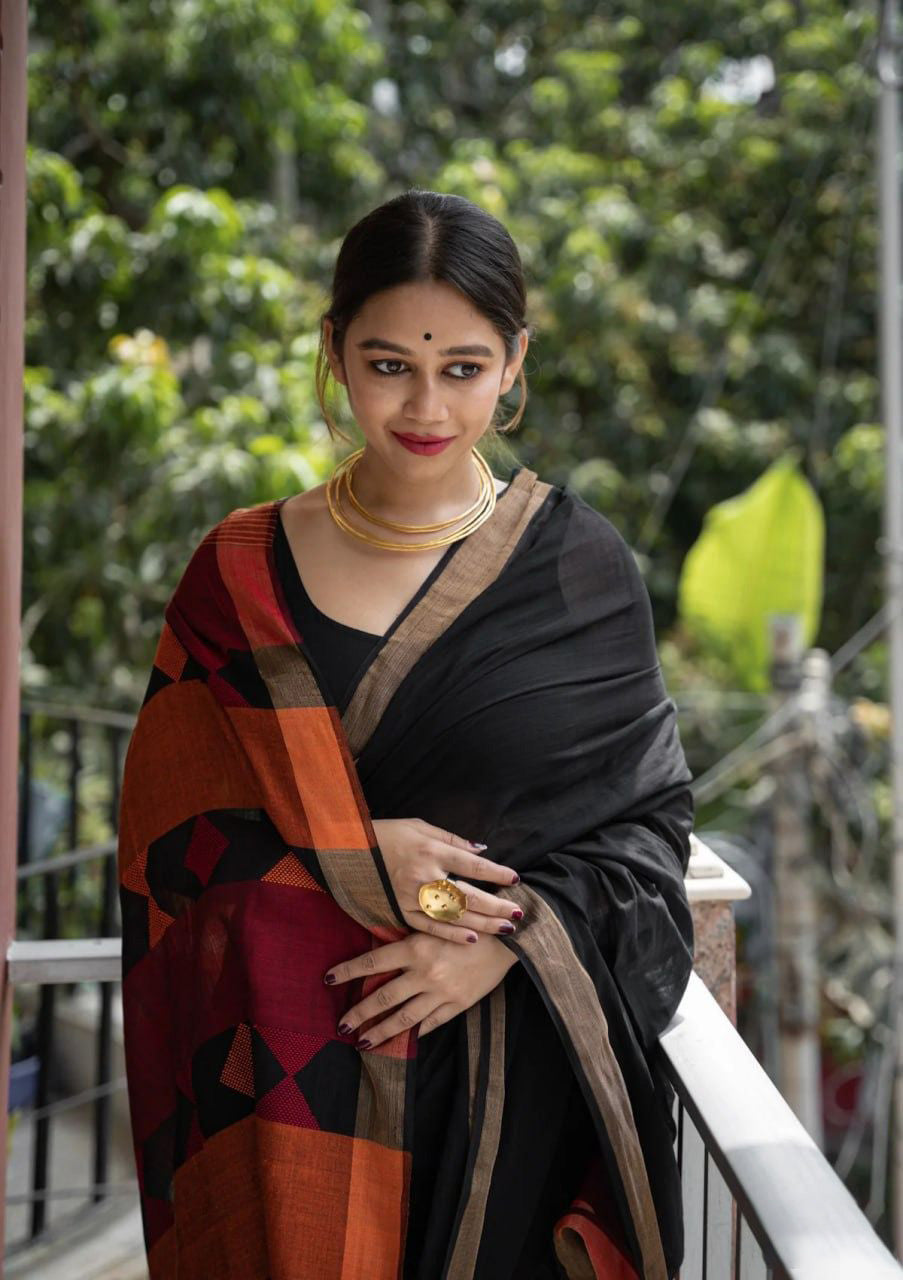 Quintessential Black Cotton Silk Saree With Fugacious Blouse Piece