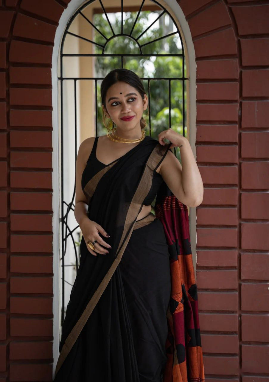 Quintessential Black Cotton Silk Saree With Fugacious Blouse Piece