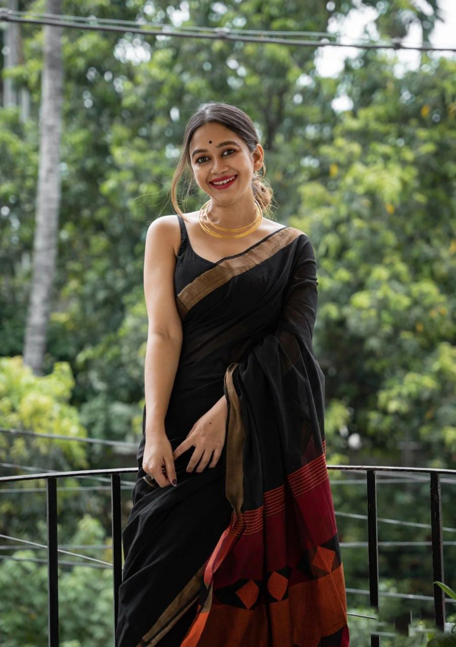 Quintessential Black Cotton Silk Saree With Fugacious Blouse Piece