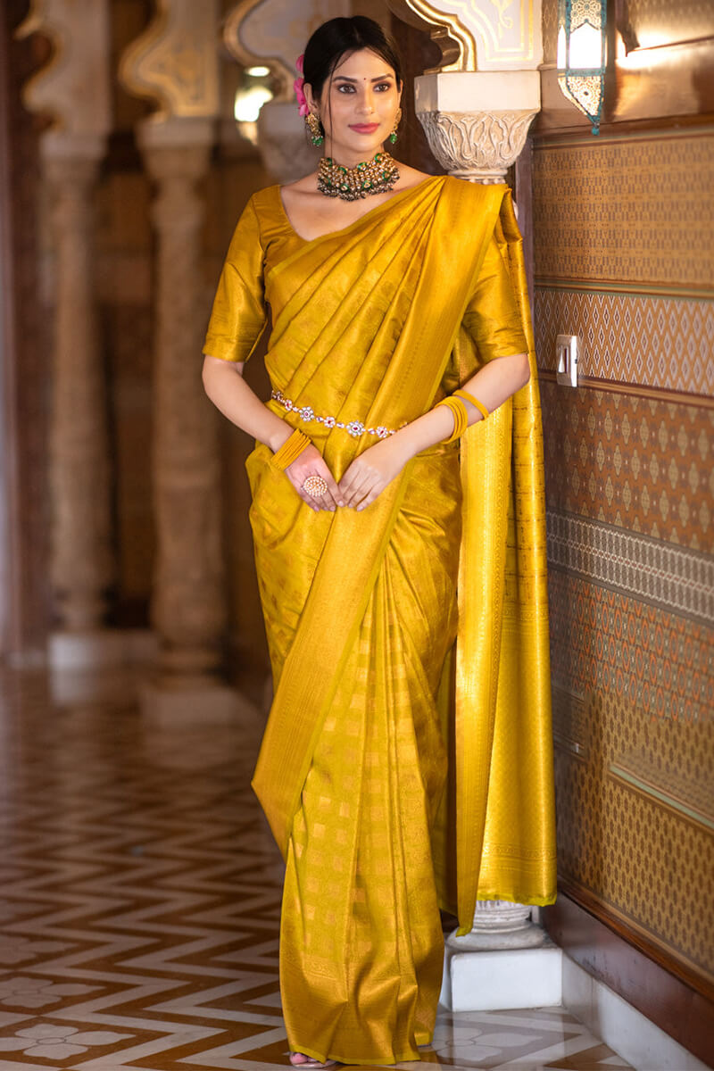 Classy Yellow Soft Silk Saree With Splendiferous Blouse Piece