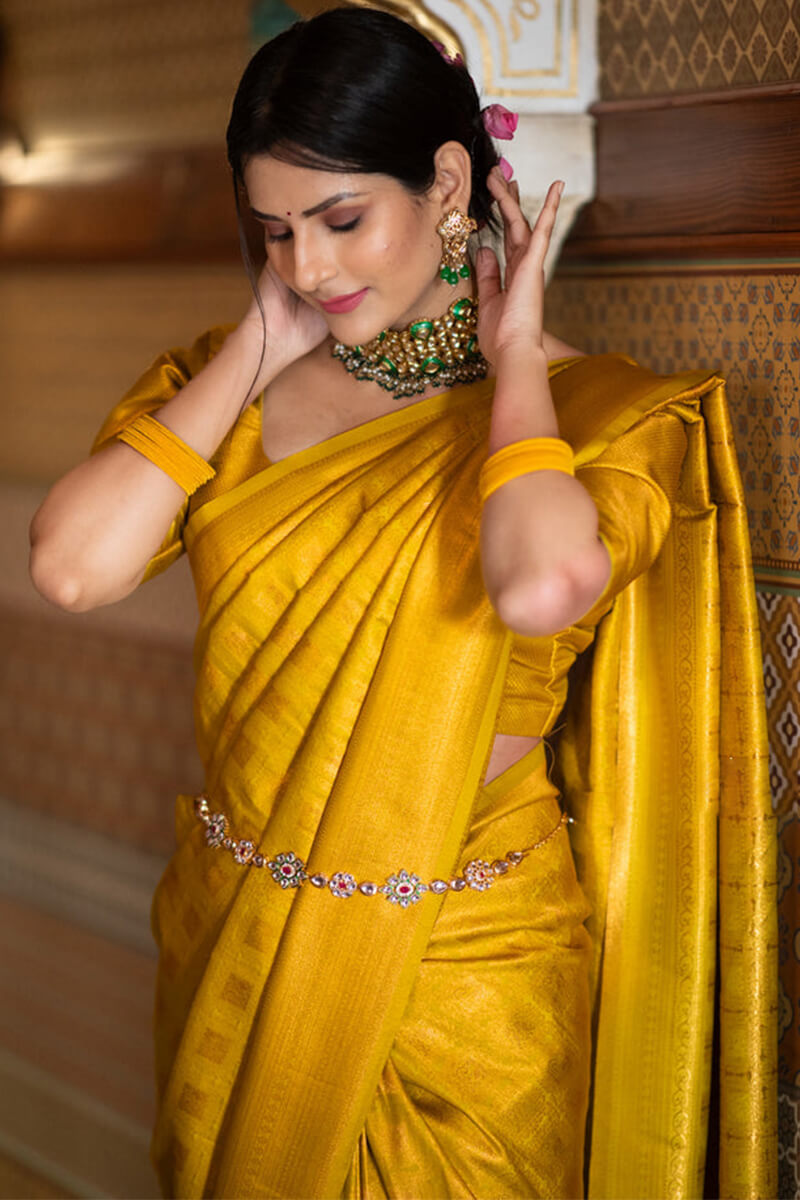 Classy Yellow Soft Silk Saree With Splendiferous Blouse Piece