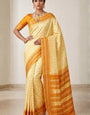 Arresting Yellow Soft Silk Saree With Energetic Blouse Piece